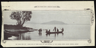 Black and White Photograph of Maori Boys in a Canoe