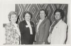 Business and Professional Women's Club Members Posing in Front of a Blanket